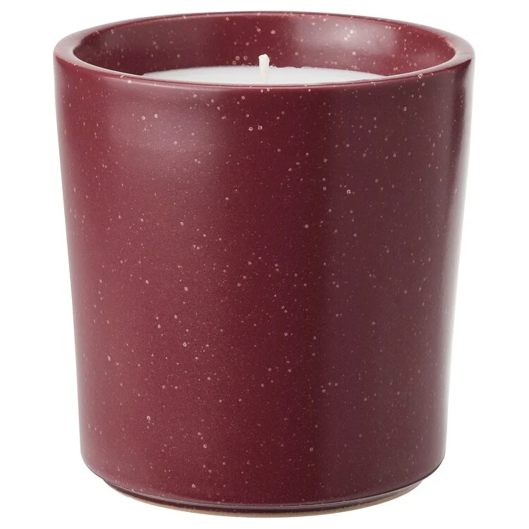 Scented candle in ceramic jar